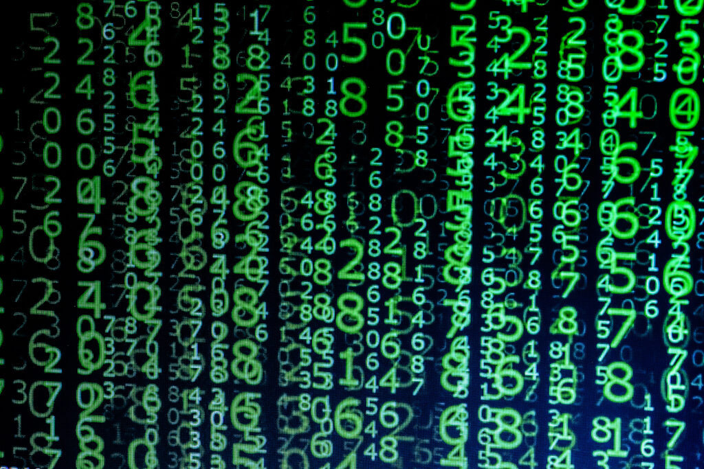 Green numbers on a black screen. Background matrix style. Green is the dominant color. Code in green. Data in binary code. Computer virus and hacker screen background.